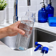 Filling the X-All Multi-Purpose Spray bottle with water